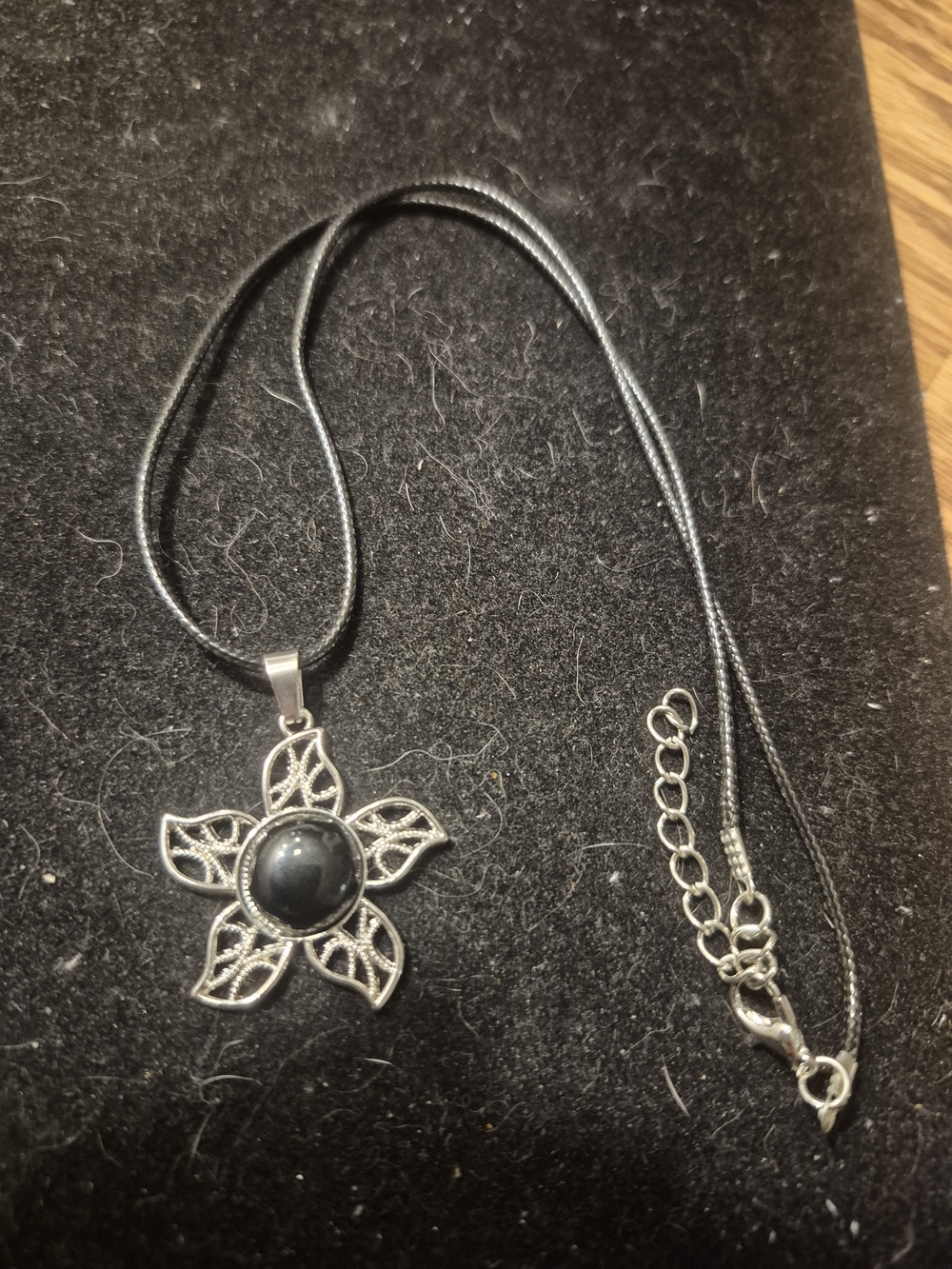 Silver Floral Pendant Necklace with Black Stone